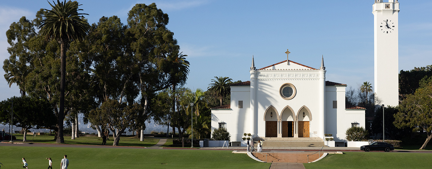 A view of Sacred Heart Chapel from across Sunken Garden