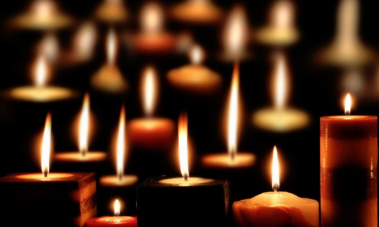 imagery of candles at night during a vigil