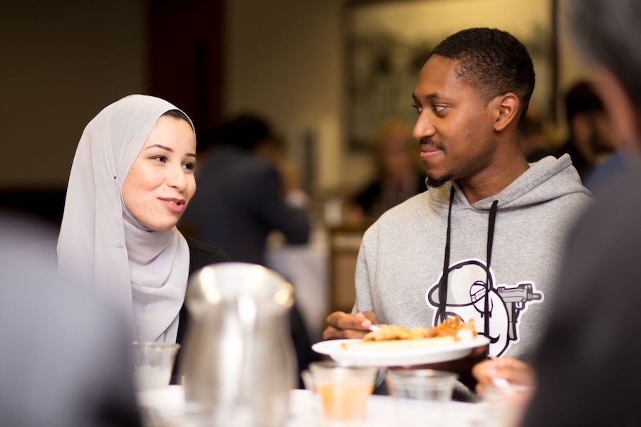 Students talk at the Muslim Student Life Iftar held at The Hill on the LMU campus in 2018.